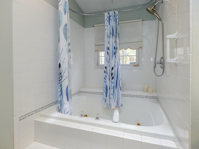 full bathroom featuring tiled shower / bath
