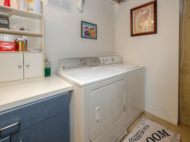 laundry room featuring laundry area, visible vents, and washer and dryer