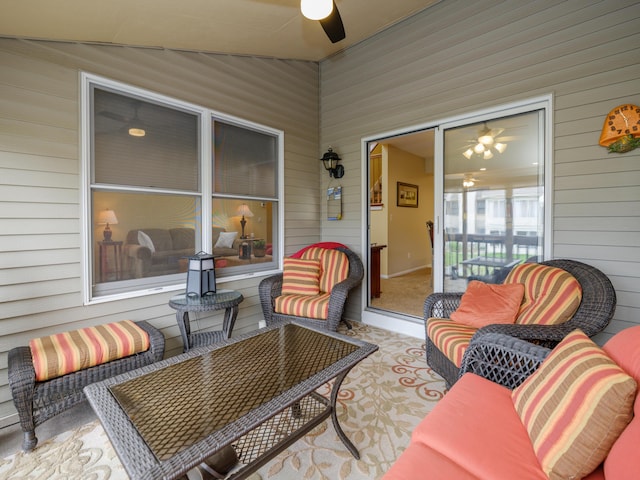 exterior space with a ceiling fan and an outdoor living space