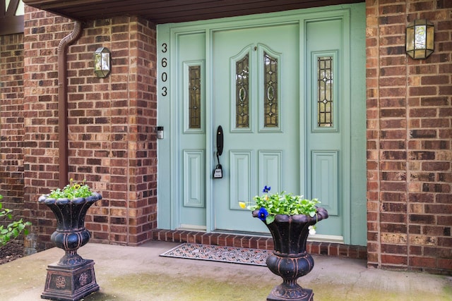 3603 Creekside Dr, Ann Arbor, MI 48105 - doorway to property featuring brick siding