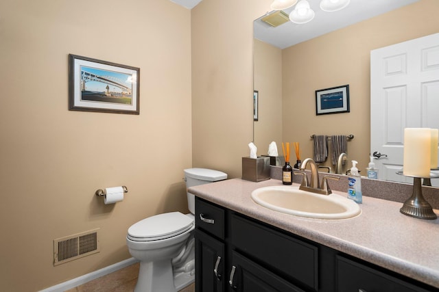 3603 Creekside Dr, Ann Arbor, MI 48105 - half bathroom with toilet, tile patterned floors, vanity, and visible vents