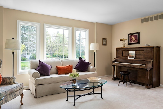 3603 Creekside Dr, Ann Arbor, MI 48105 - living room featuring carpet flooring, baseboards, and visible vents