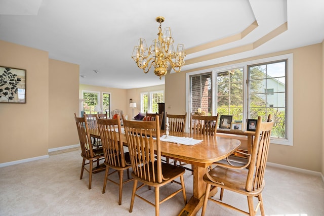 3603 Creekside Dr, Ann Arbor, MI 48105 - dining space with a chandelier, light carpet, and baseboards