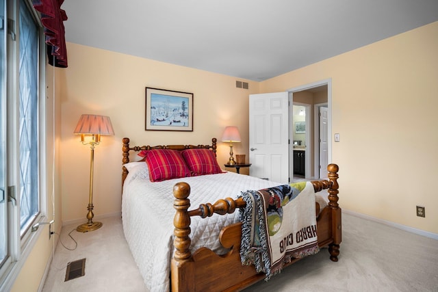 3603 Creekside Dr, Ann Arbor, MI 48105 - carpeted bedroom with baseboards and visible vents