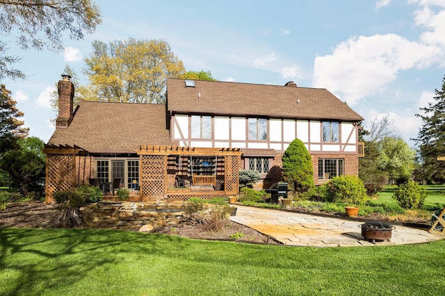 3603 Creekside Dr, Ann Arbor, MI 48105 - rear view of property featuring an outdoor fire pit, brick siding, a patio, and a pergola