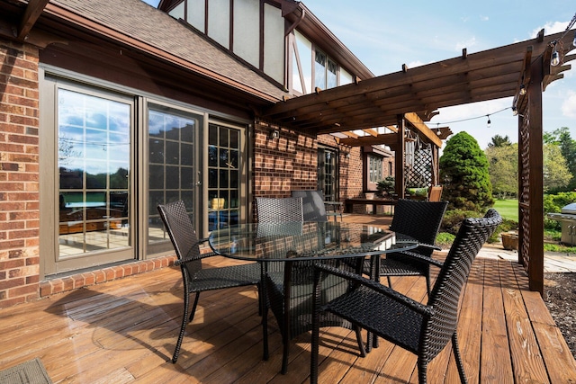 3603 Creekside Dr, Ann Arbor, MI 48105 - wooden deck with outdoor dining area and a pergola