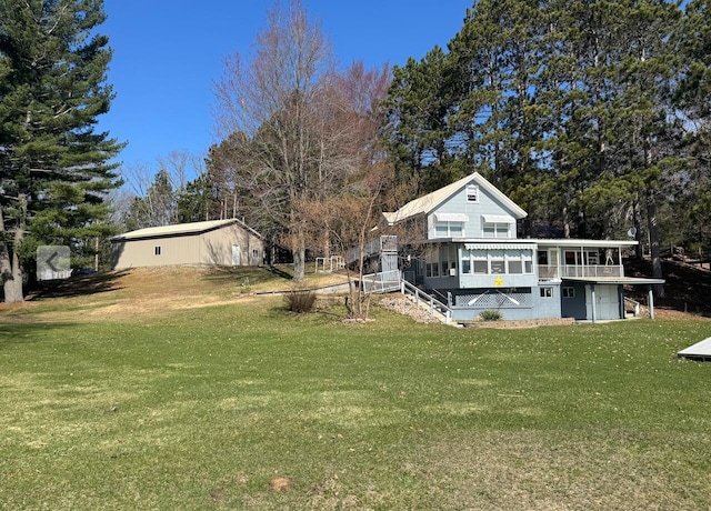 view of yard featuring a wooden deck