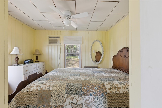 10458 Sleepy Hollow Ln, Mecosta, MI 49332 - bedroom featuring an AC wall unit and ceiling fan