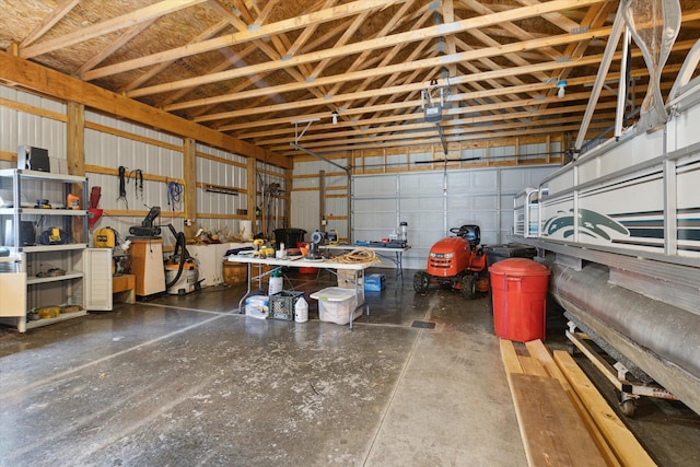 10458 Sleepy Hollow Ln, Mecosta, MI 49332 - garage with a garage door opener