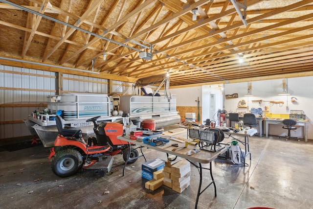 10458 Sleepy Hollow Ln, Mecosta, MI 49332 - garage featuring a garage door opener