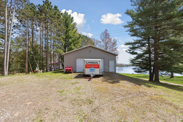 10458 Sleepy Hollow Ln, Mecosta, MI 49332 - detached garage featuring a water view