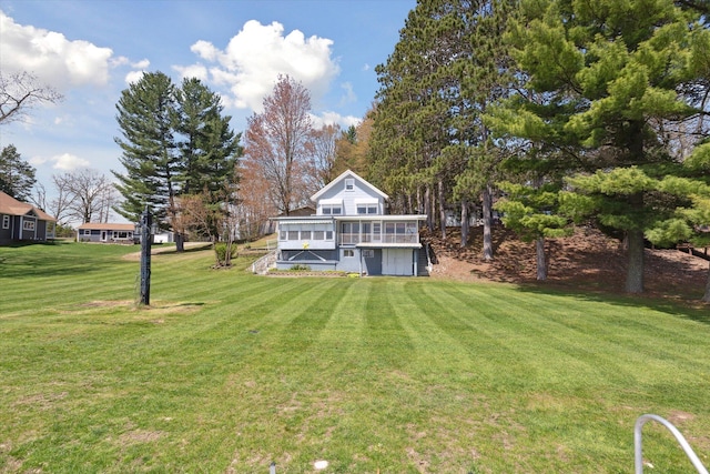 10458 Sleepy Hollow Ln, Mecosta, MI 49332 - back of house with a yard, a wooden deck, and stairs