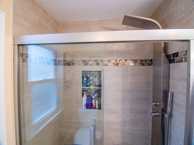bathroom featuring a stall shower