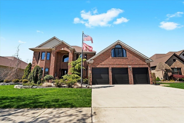 traditional-style house featuring concrete driveway, brick siding, and a front lawn