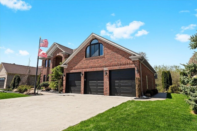 traditional-style home featuring concrete driveway, brick siding, an attached garage, and a front lawn