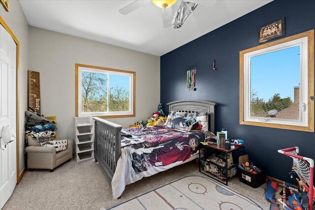 bedroom with carpet flooring and ceiling fan