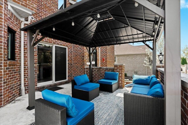 view of patio / terrace with a gazebo and outdoor lounge area