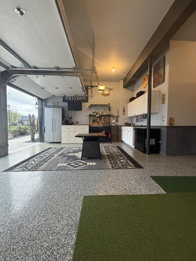 garage featuring high end fridge