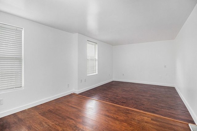 3012 Lansdowne Rd, Waterford, MI 48329 - spare room featuring wood finished floors and baseboards