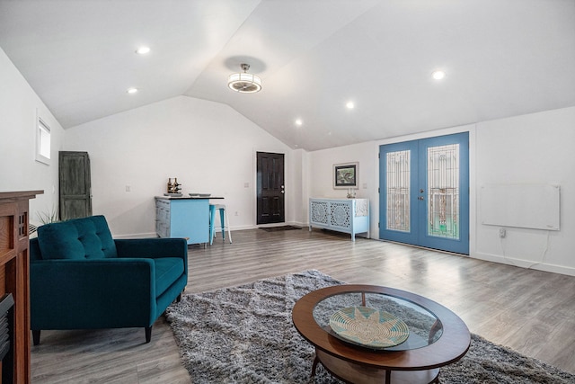 3012 Lansdowne Rd, Waterford, MI 48329 - living room featuring lofted ceiling, wood finished floors, french doors, recessed lighting, and baseboards