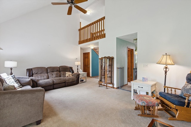 11104 Southbrook Dr, Ceresco, MI 49033 - living area featuring high vaulted ceiling, light carpet, and a ceiling fan