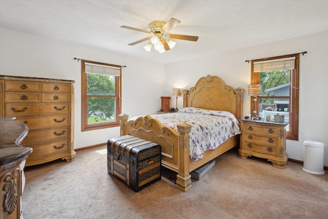 11104 Southbrook Dr, Ceresco, MI 49033 - bedroom featuring multiple windows, light colored carpet, and baseboards