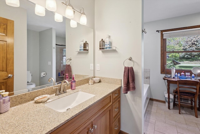 11104 Southbrook Dr, Ceresco, MI 49033 - bathroom with toilet, vanity, baseboards, and a bathtub