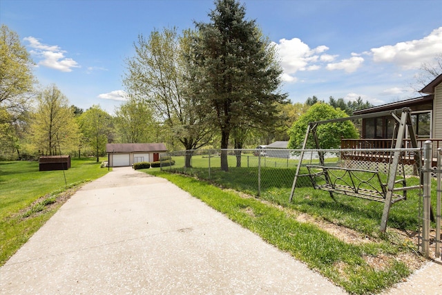 11104 Southbrook Dr, Ceresco, MI 49033 - view of home's community with a garage
