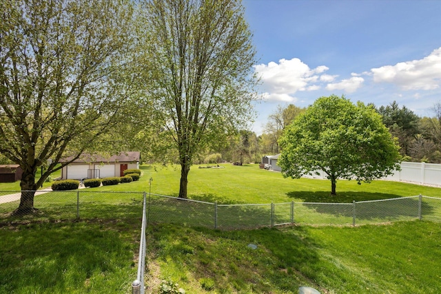 11104 Southbrook Dr, Ceresco, MI 49033 - view of yard featuring a garage
