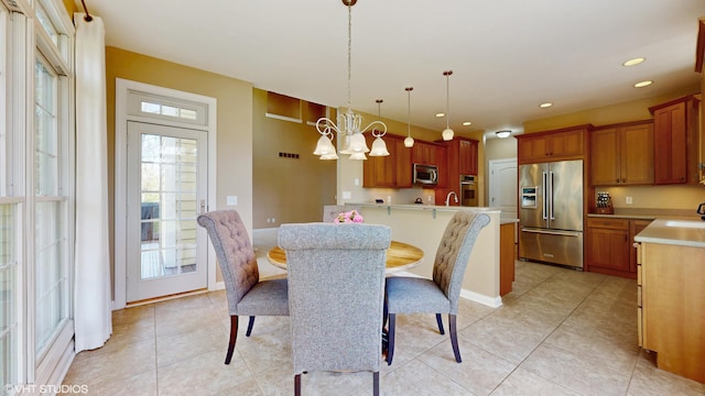 7272 Holden Rd, Stevensville, MI 49127 - dining space with an inviting chandelier, light tile patterned flooring, visible vents, and recessed lighting