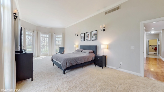 7272 Holden Rd, Stevensville, MI 49127 - bedroom featuring baseboards, ornamental molding, visible vents, and carpet