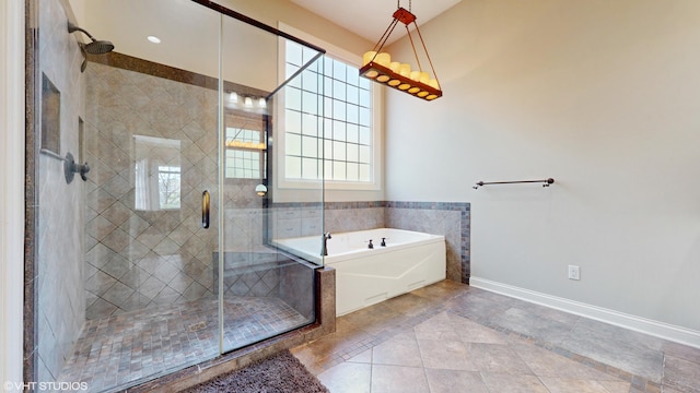 7272 Holden Rd, Stevensville, MI 49127 - bathroom with a bath, baseboards, and a stall shower