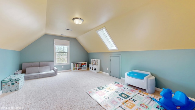 7272 Holden Rd, Stevensville, MI 49127 - playroom with carpet flooring, visible vents, baseboards, and lofted ceiling