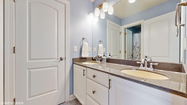 7272 Holden Rd, Stevensville, MI 49127 - bathroom with a sink and double vanity