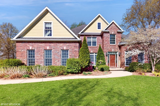 7272 Holden Rd, Stevensville, MI 49127 - traditional-style house featuring brick siding and a front lawn