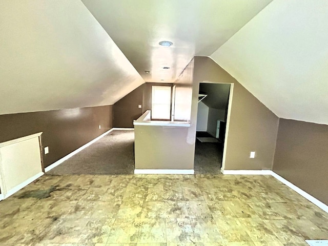 16476 Rossini Dr, Detroit, MI 48205 - additional living space with lofted ceiling and baseboards