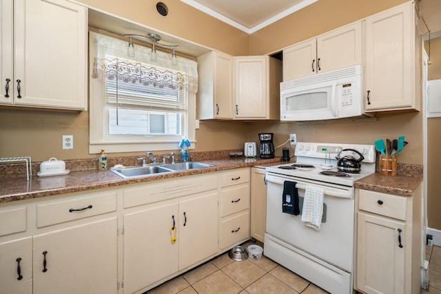 kitchen featuring a sink, white appliances, light tile patterned flooring, crown molding, and white cabinetry