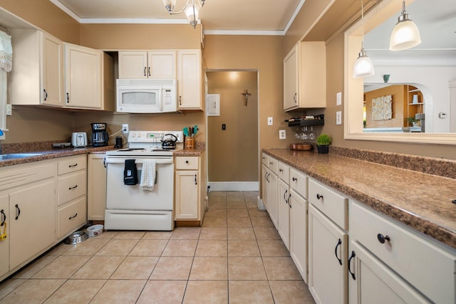 kitchen featuring white appliances, decorative light fixtures, light tile patterned flooring, crown molding, and white cabinets