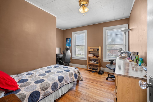 18511 Margareta St, Detroit, MI 48219 - bedroom with wood finished floors and a desk