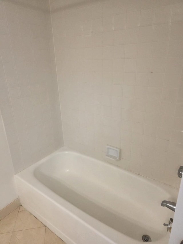 3320 Spinnaker Ln Unit 15E, Detroit, MI 48207 - bathroom with tile patterned flooring, baseboards, and shower / tub combination