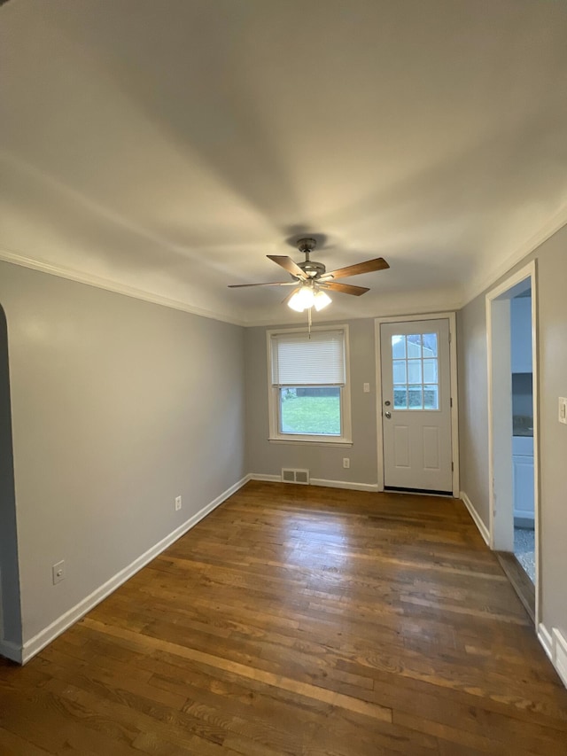 2575 Ellwood Ave, Berkley, MI 48072 - foyer entrance with ceiling fan, dark wood-type flooring, and baseboards