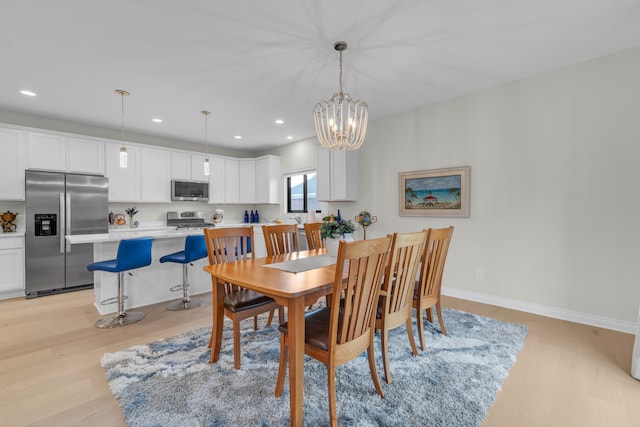 3166 Roma, Wixom, MI 48393 - dining area featuring light wood finished floors, a chandelier, recessed lighting, and baseboards