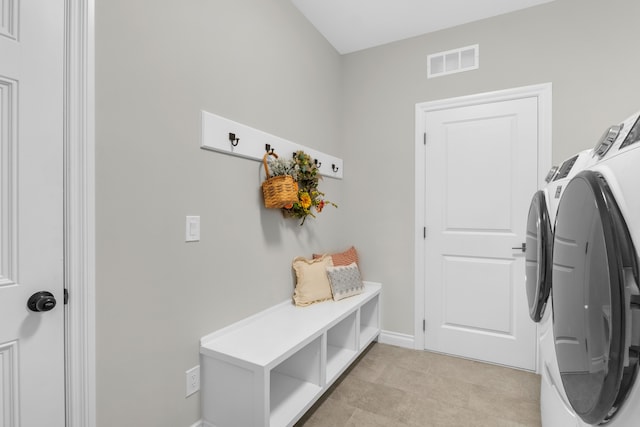 3166 Roma, Wixom, MI 48393 - clothes washing area with independent washer and dryer and baseboards