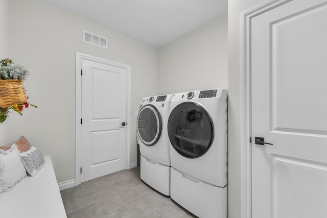 3166 Roma, Wixom, MI 48393 - washroom with independent washer and dryer and baseboards