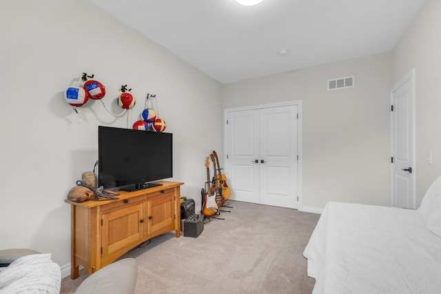 3166 Roma, Wixom, MI 48393 - bedroom with light colored carpet, baseboards, and a closet