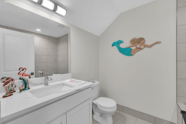 3166 Roma, Wixom, MI 48393 - bathroom with lofted ceiling, toilet, tile patterned floors, and vanity