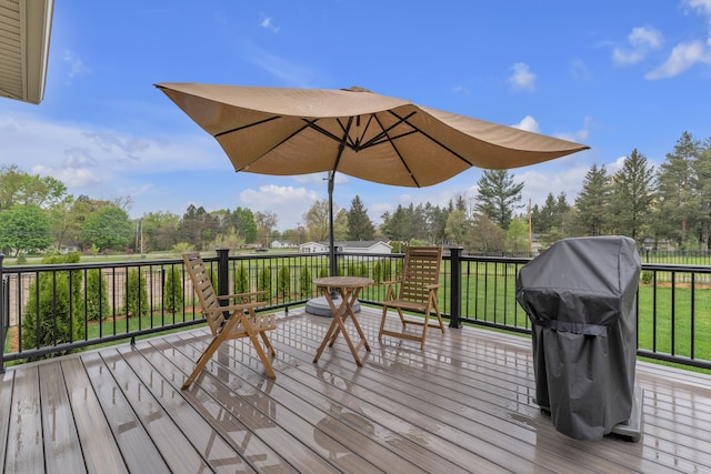 3166 Roma, Wixom, MI 48393 - wooden terrace featuring area for grilling and view of wooded area