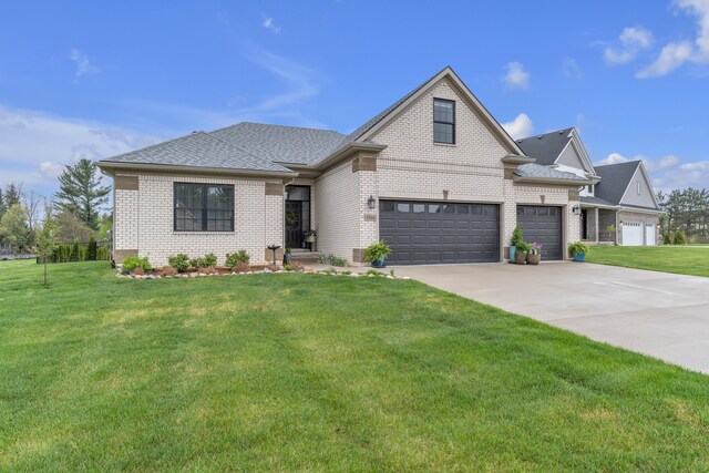 3166 Roma, Wixom, MI 48393 - view of front of house with brick siding, a front yard, driveway, roof with shingles, and a garage