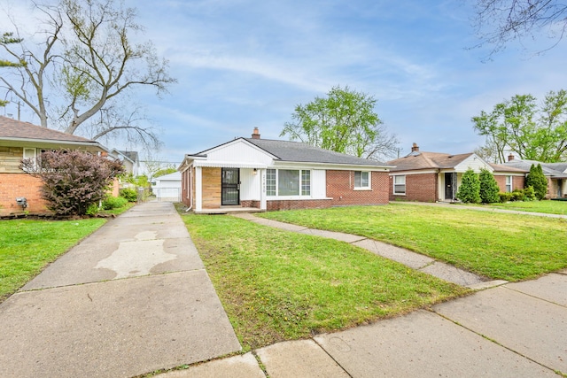 21430 Ridgedale St, Oak Park, MI 48237 - view of front of home featuring a chimney, brick siding, and a front lawn