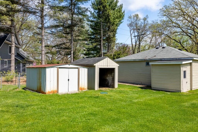 view of shed with fence